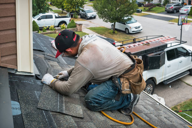 Professional Roofing technician working in Bergen, NY